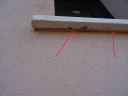 goutte d_eau contre la facade non conforme